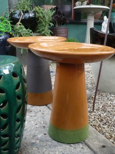 what bird wouldn't feel extra special taking a sip from this lovely saffron birdbath?