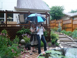 Super cool wonder designer Jenny Peterson snaps away in the rain while my Aunt Nora plays photo assistant